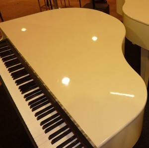 two white pianos